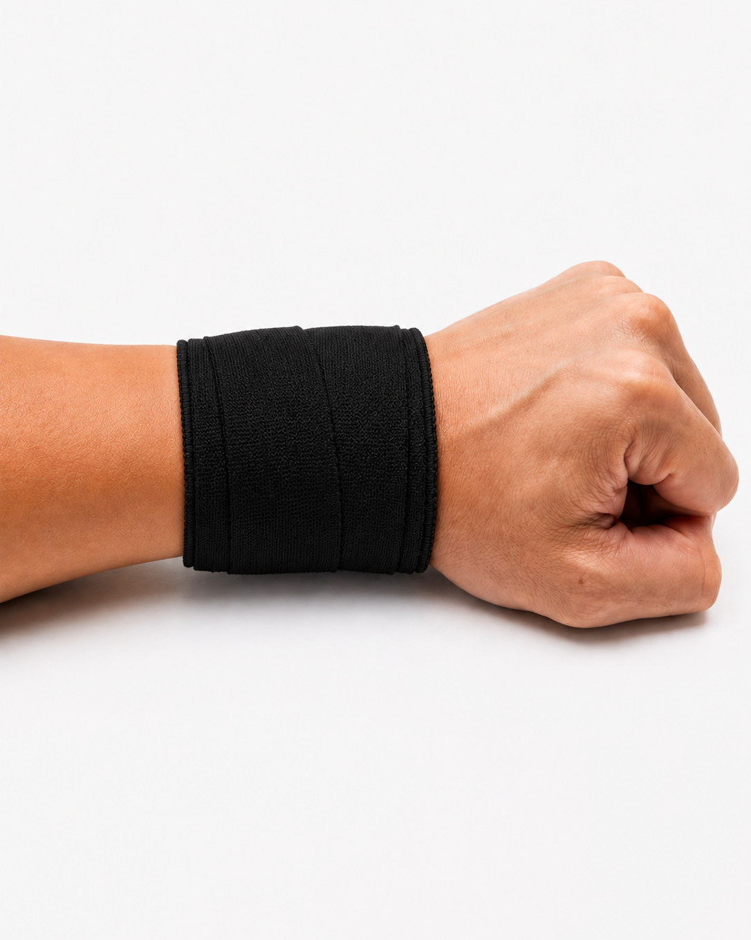 Athlete wearing black wrist tape for wrist support during calisthenics and handstand practice