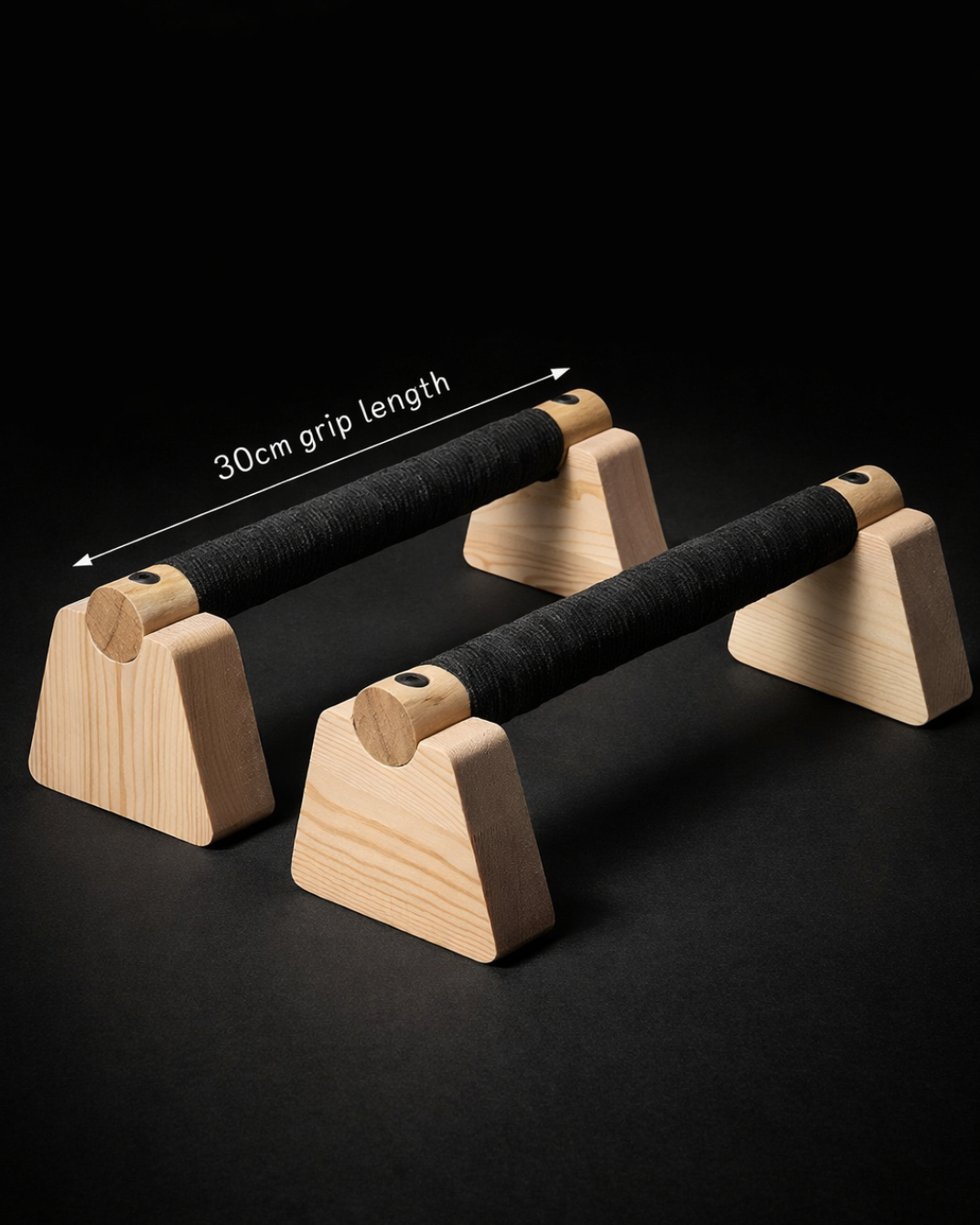 Close-up of Core Wood Push Bars™ showing ergonomic wooden handles with textured black grip, designed to reduce wrist strain during push-ups and calisthenics