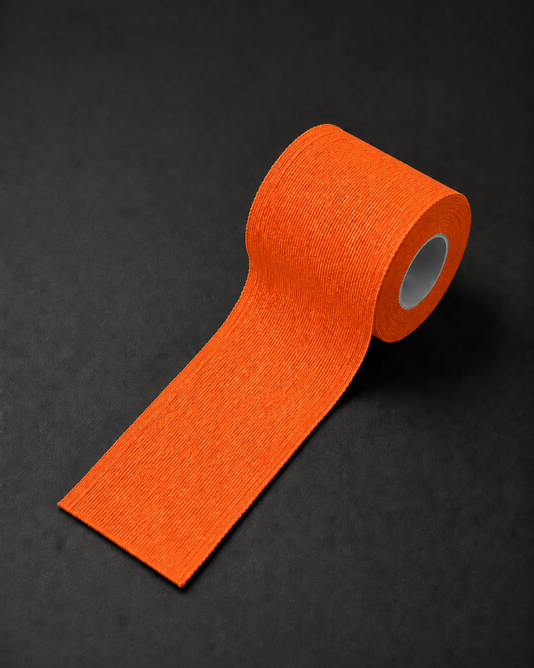 Orange wrist tape roll designed for calisthenics handstands strength training and wrist support