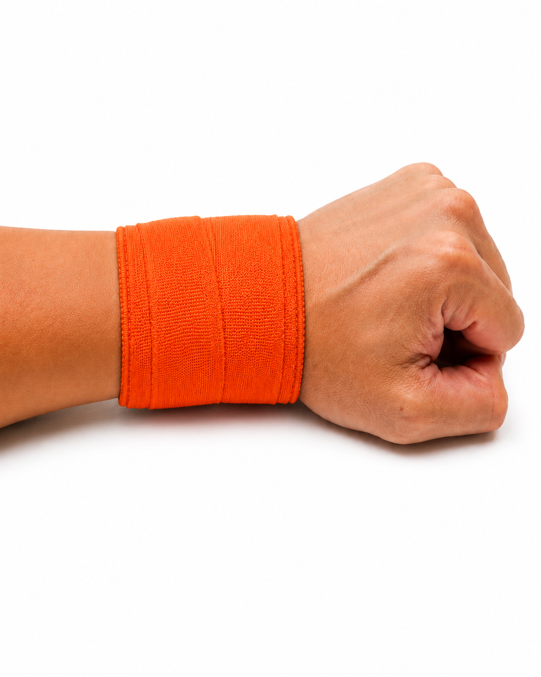 Athlete wearing orange wrist tape for wrist support during calisthenics handstands and strength training