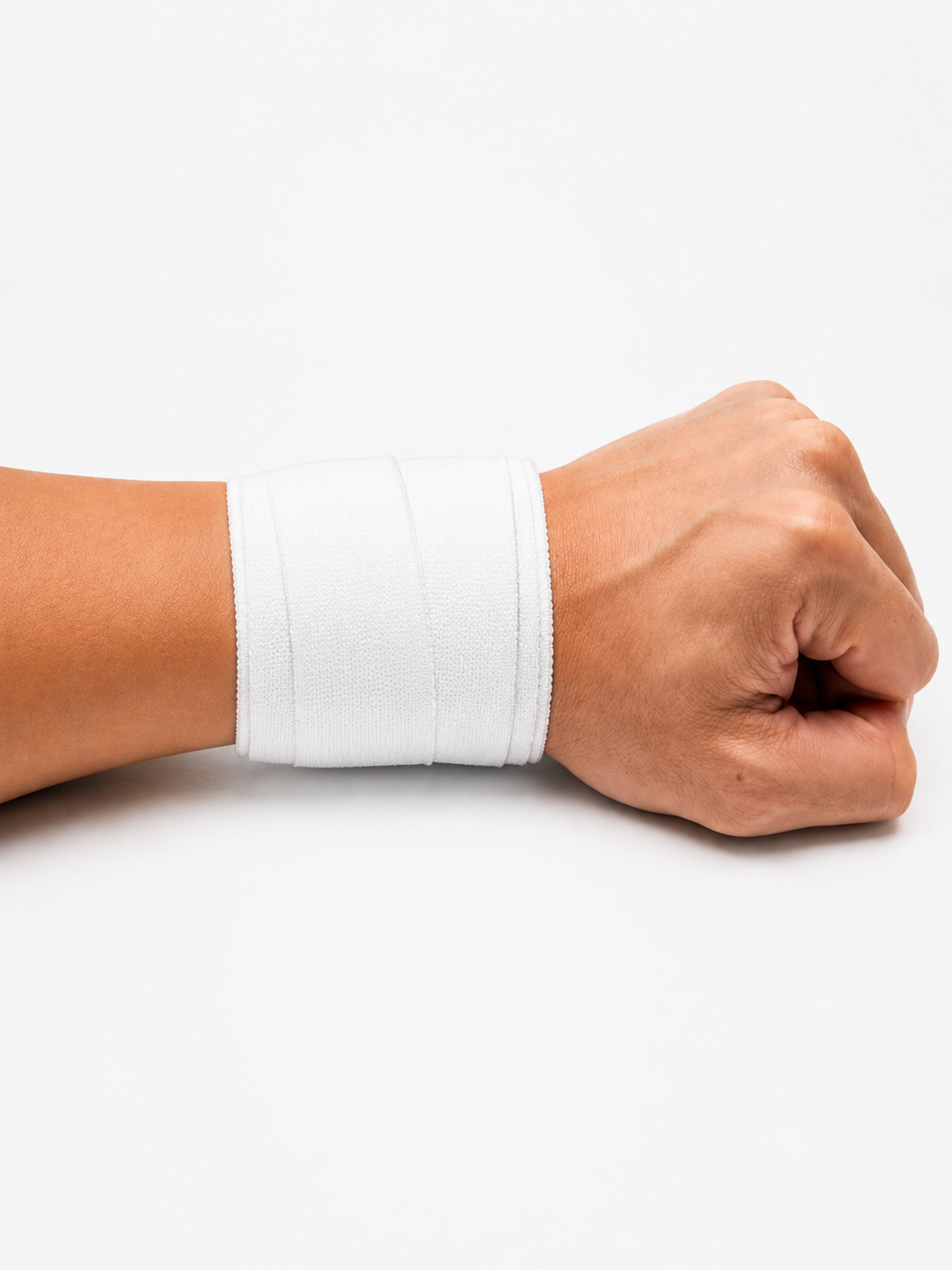 Close up of white wrist tape providing wrist stability during calisthenics strength training and gymnastics